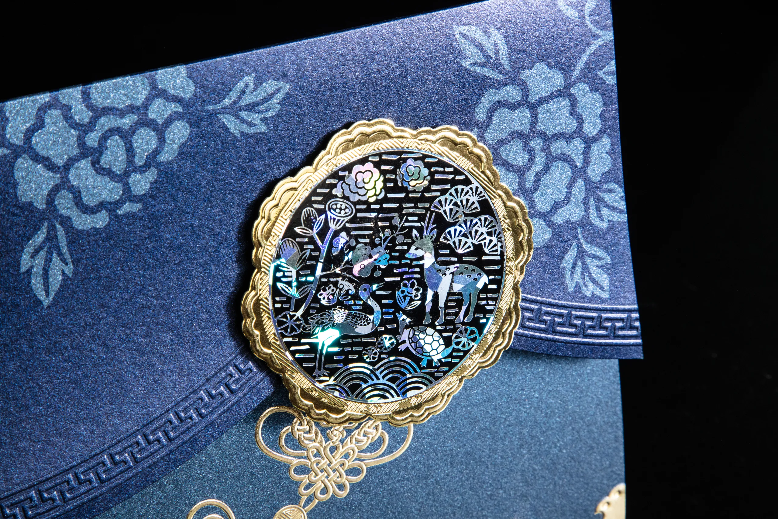 Holographic foil medallion on a New Year card